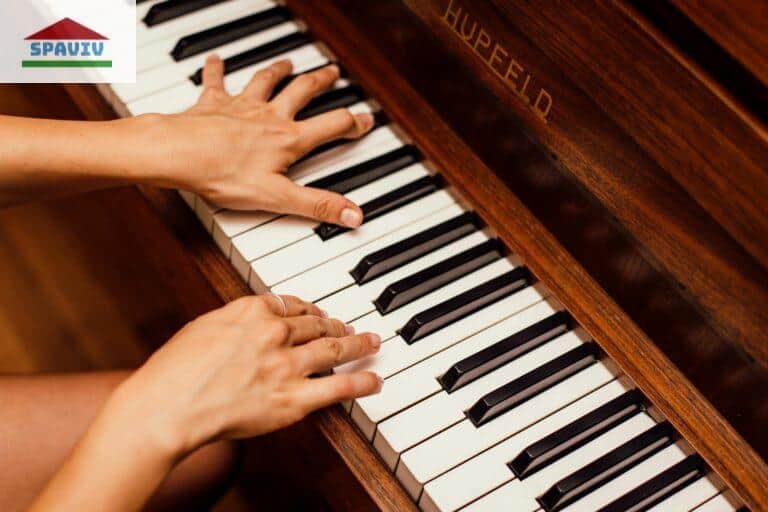 Close-Up Photo Of Person Playing Piano