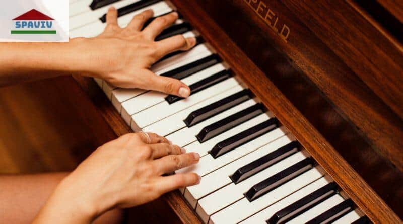 Close-Up Photo Of Person Playing Piano