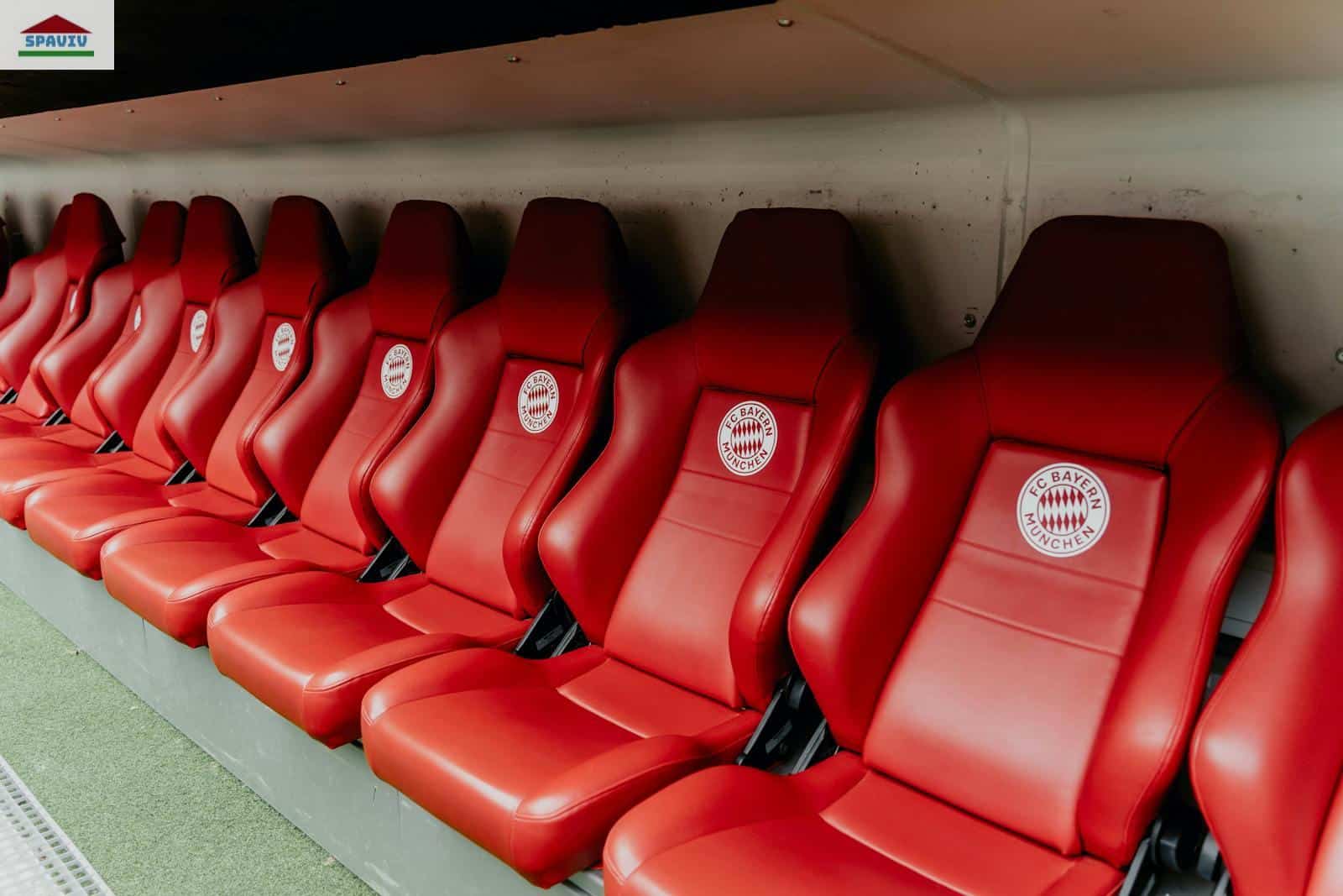 Red seats at Bayern Munich's Allianz Arena, showcasing iconic stadium design.